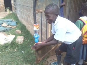 Child in St Prisca School Handwashing With SpaTap